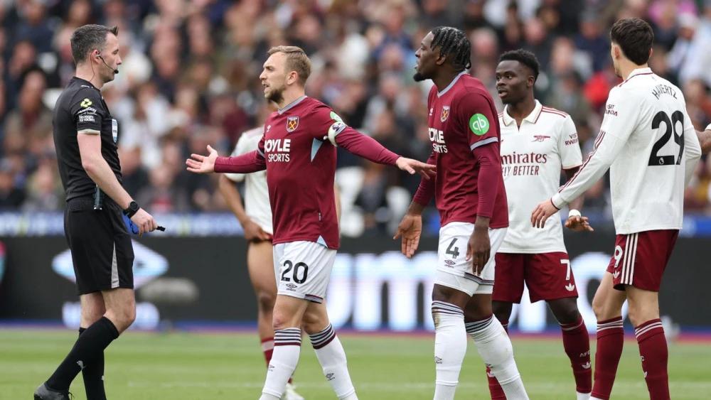 Arsenal survive late VAR controversy to edge West Ham and keep title charge alive