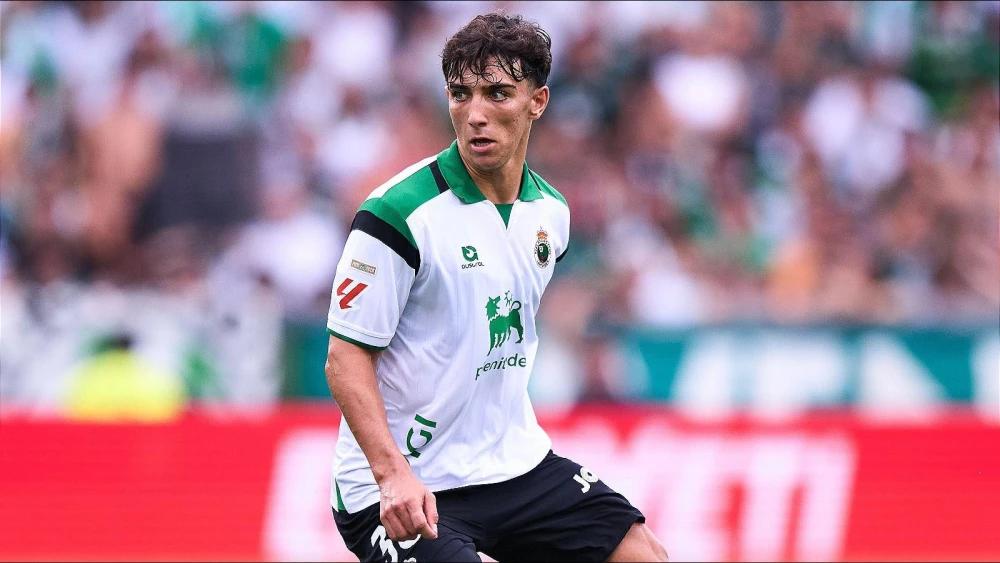 Real Madrid snap up midfielder Sergio Martinez from Racing Santander