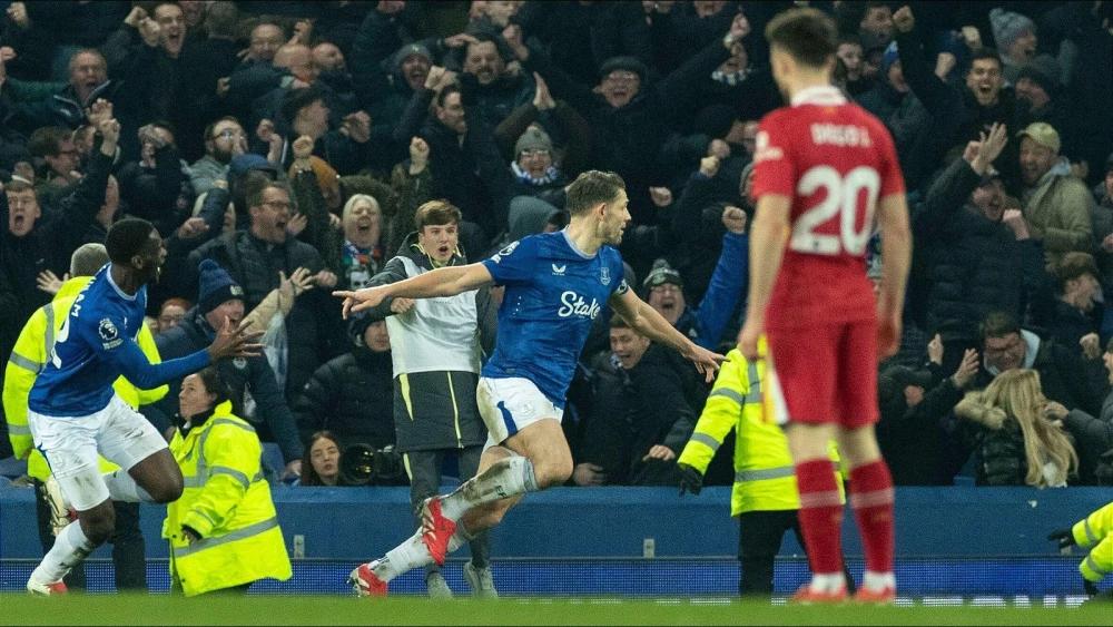 James Tarkowski's thunderbolt salvages Everton draw against Liverpool