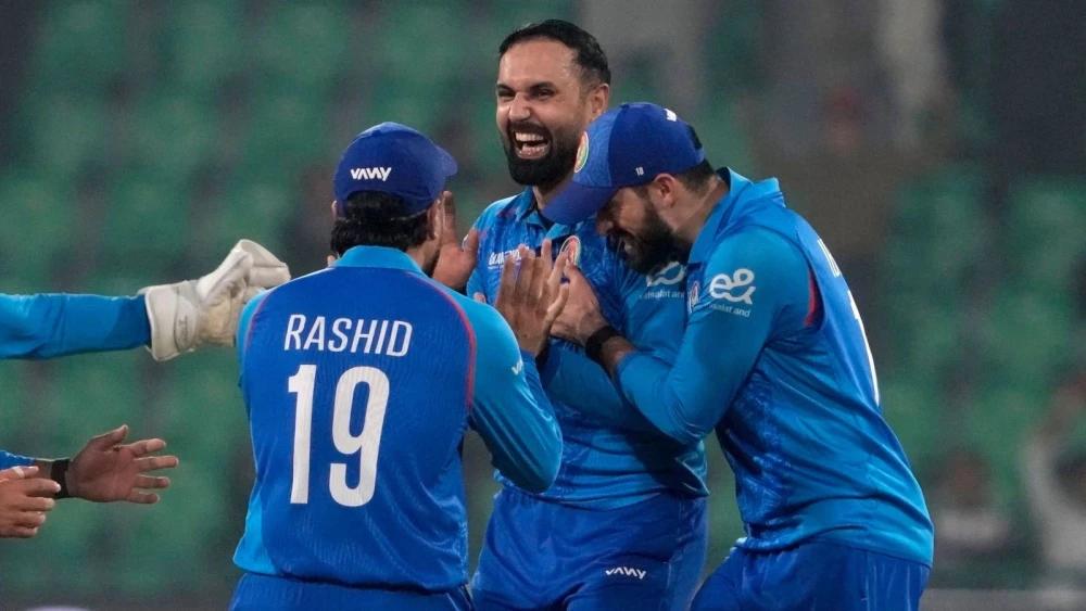 Afghanistan stun England, set up high-stakes clash with Australia