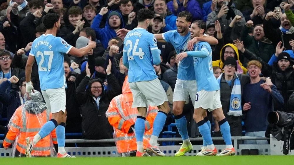 Man City keep pressure on league leaders while Chelsea are held at Bournemouth