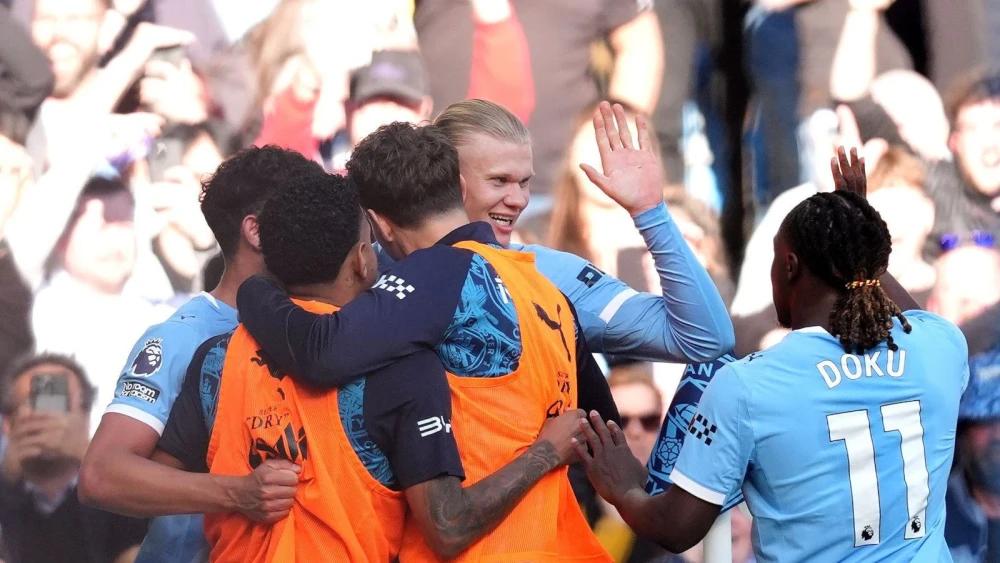 Man City turn up title heat as Erling Haaland sinks Arsenal in Etihad thriller