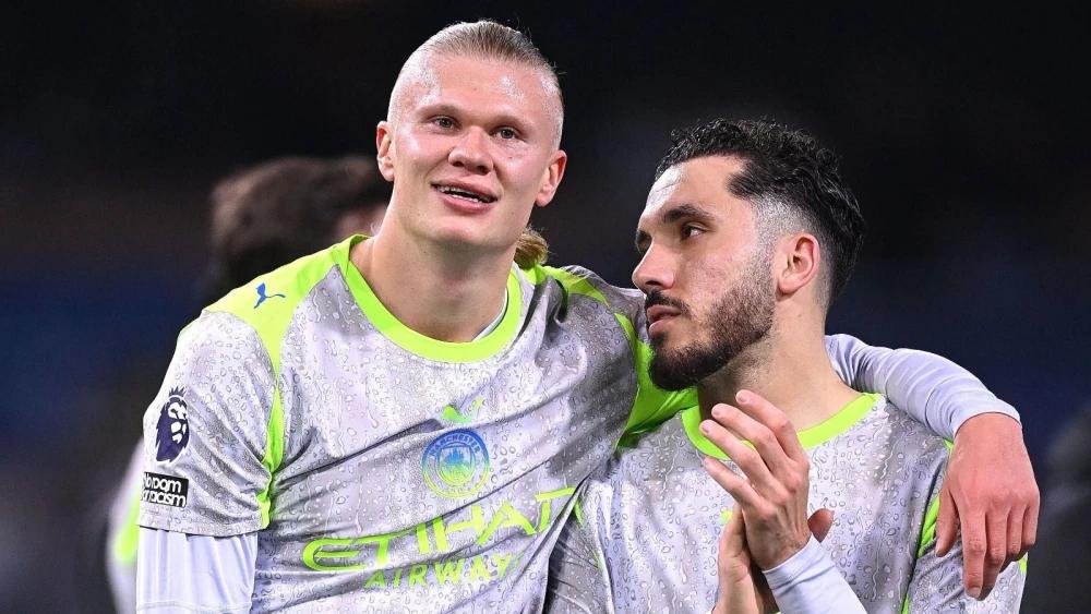 Erling Haaland "super happy" after Man City climb to the summit