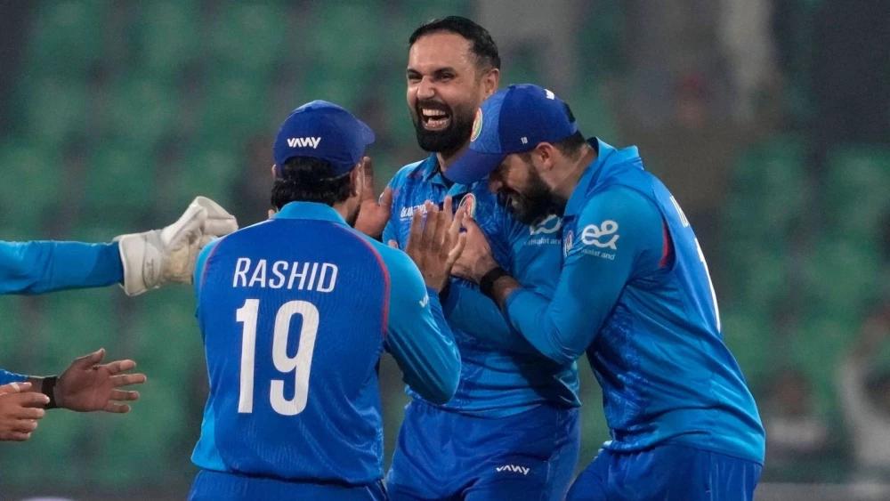 Afghanistan stun England, set up high-stakes clash with Australia